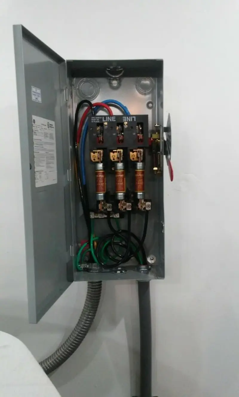 Three-phase disconnect switch installed for Smoke Detector Installation in Garden City